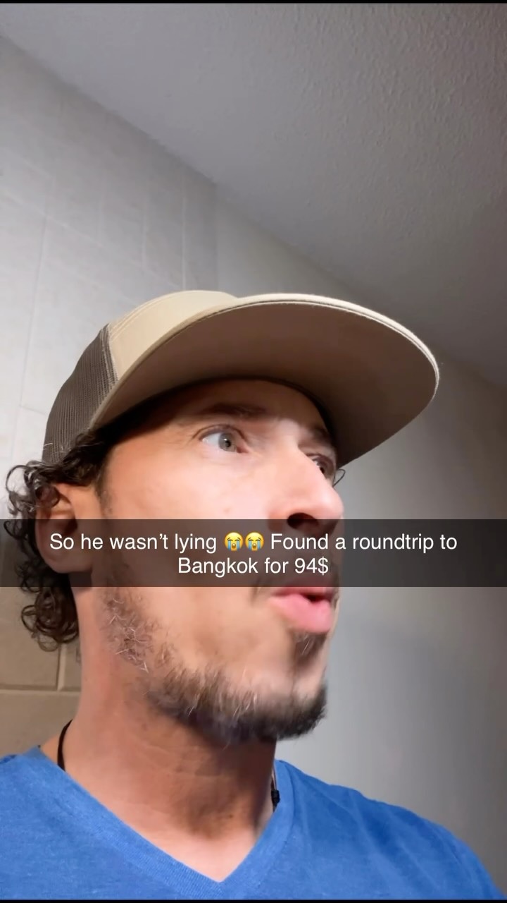 Eric in a cap sharing a Bangkok travel find